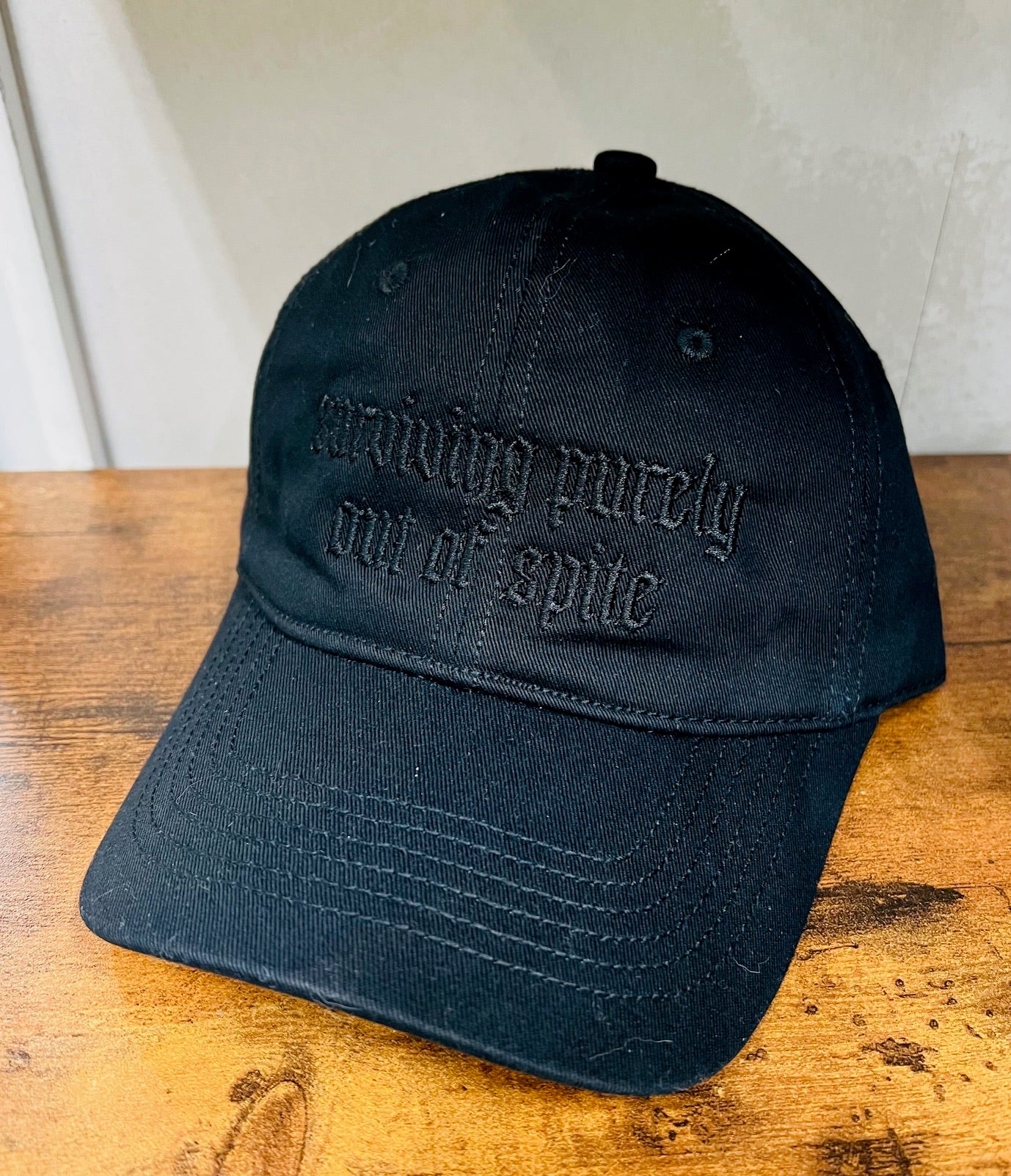 Black on Black - Surviving Purely out of Spite - Embroidered Dad Hat - READY TO SHIP